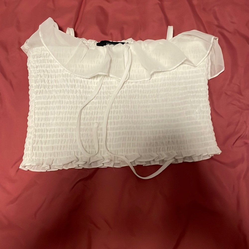 Here is a brand new tank top no stains or rips